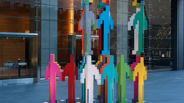 Colorful statues standing in a row